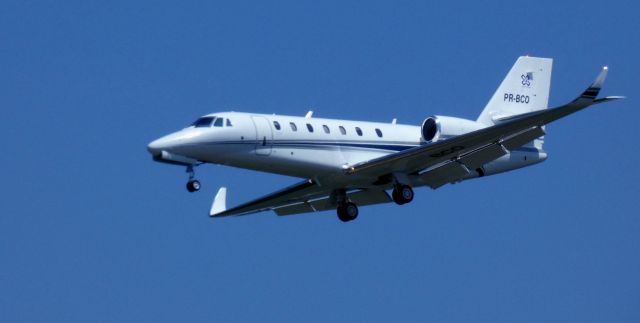 Cessna Citation Sovereign (PR-BCO) - About to touch down is this 2007 Cessna Citation Sovereign in the Spring of 2025. Brazil Registration.