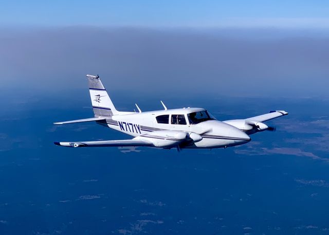 Piper PA-30 Twin Comanche (N7171Y) - Taken from N95044 while high over the Piney Woods. 