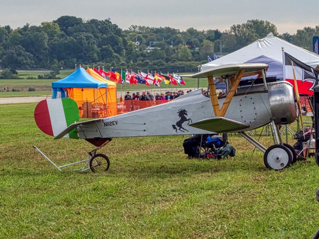 N112EV — - N112EV Nieuport 23 replica at the Dawn Patrol 09/2018 NMUSAF at Wright Patterson AFB. The rc aircraft area is in the background right