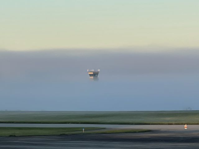 — — - October 24, 2022. Fog was covering the runway and control tower at Arnold Palmer Regional Airport, but no fog on the East ramp.