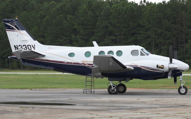 Beechcraft King Air 90 (N330V) - This King Air is fitted to ferry skydivers. This photo was taken after it had a gear-up landing accident. Photo taken on 8/15/2020.