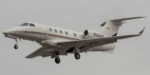 Embraer Phenom 300 (N426QS) - NetJets Embraer Phenom EMB-505 arriving from Miami landing on runway 29 at Newark on 1/25/22.