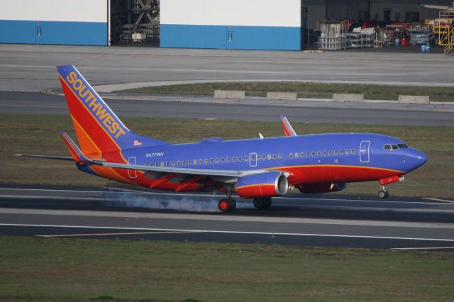 BOEING 737-300 (N477WN) - Southwest Flight 1054 (N477WN) arrives on Runway 19L at Tampa International Airport following a flight from Albany International Airport