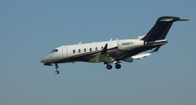 Canadair Challenger 350 (N582FX) - On final is this 2017 Bombardier Canadair Challenger 350 in the Autumn of 2020.