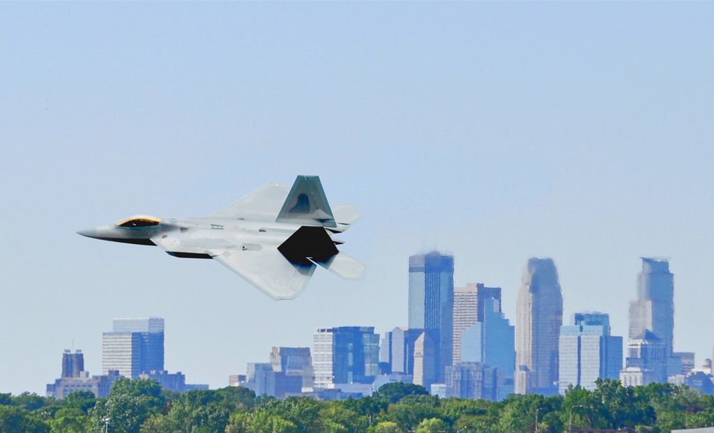 Lockheed F-22 Raptor — - A F-22 Banking away from runway 30L at the Minneapolis International air port.