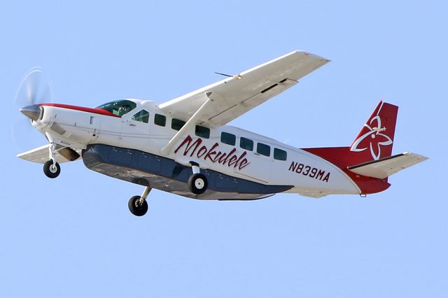 Cessna Caravan (N839MA) - Takes off. Seems like the first photo of this aircraft in the database.