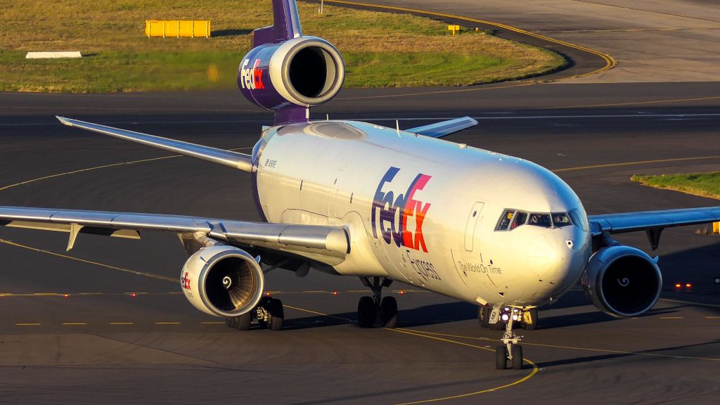 Boeing MD-11 (N591FE) - An Md11 Taxing to the Cargo bay after landing on 34L At Sydney, Shot with the Panasonic FZ1000ii from P7 International Carpark