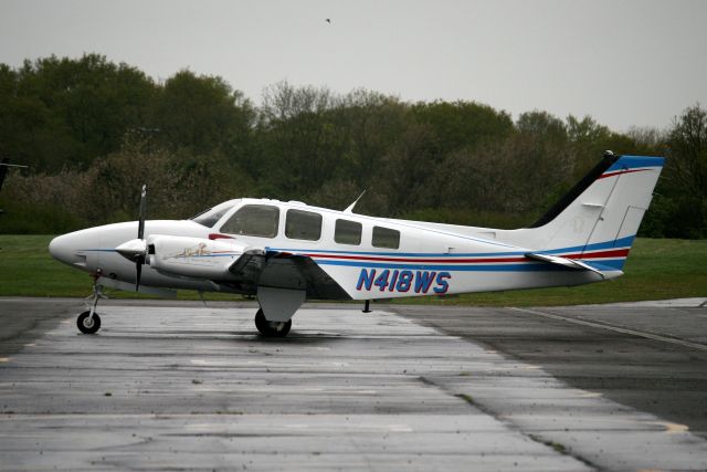 Beechcraft Baron (58) (N418WS) - 09-May-13.