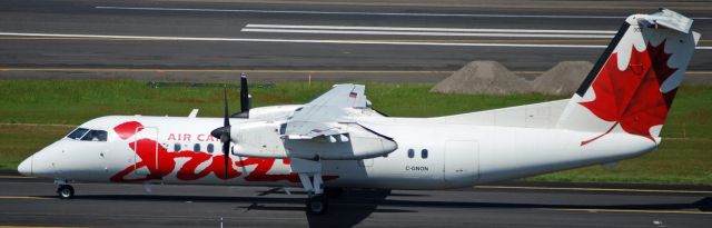 de Havilland Dash 8-300 (C-GNON) - Air Canada Jazz Taxing to Runway 28L @ Portland International Airport Destined For Vancouver B.C.