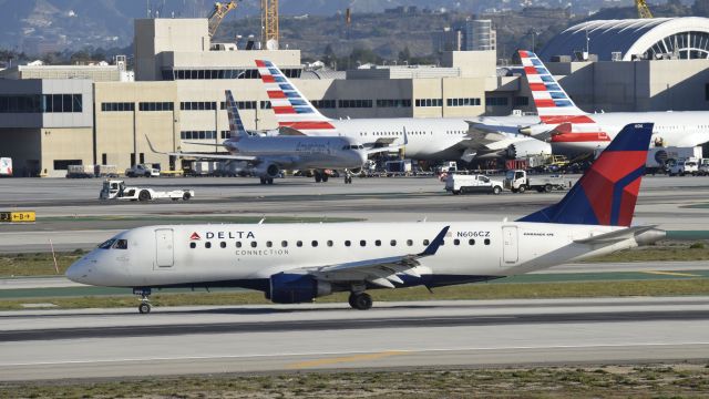 Embraer ERJ 175 (N606CZ) - Taxiing to gate at LAX after landing on 25L