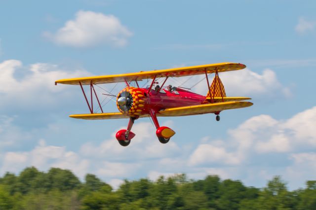 Boeing PT-17 Kaydet (N56772) - Heritage Biplanes "Tillie" does a low pass at Medina Muni. 