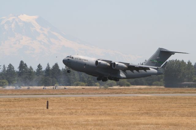 Boeing Globemaster III — - C-17 taking off from McChord AFB w/ Mt Rainier in the background 7-20-2008.