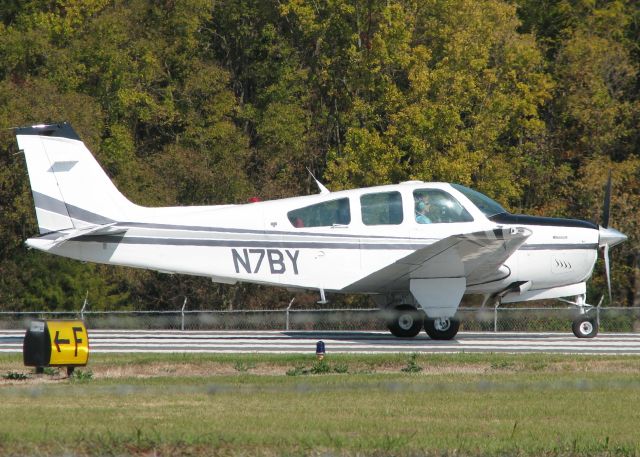 Beechcraft Bonanza (36) (N7BY) - Taking off on 14 at Downtown Shreveport.