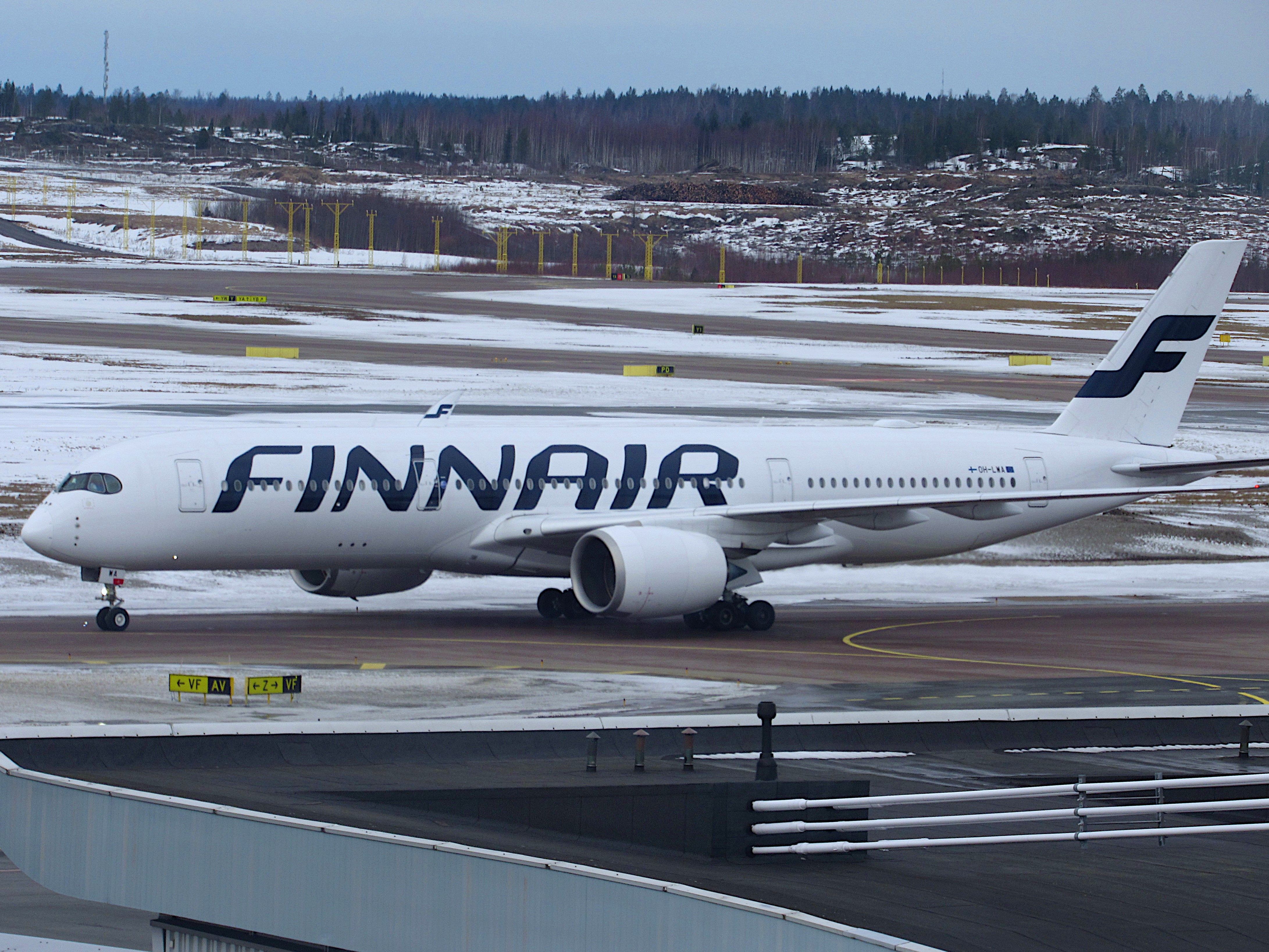 Airbus A350-900 (OH-LWA) - Flight Osaka to Helsinki. Photo taken march 21 2021 from the scenic terrace at the Helsinki Vantaa airport. 