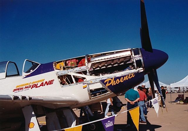 North American P-51 Mustang — - P-51 showing off what is under the hood during an air show at KAFW