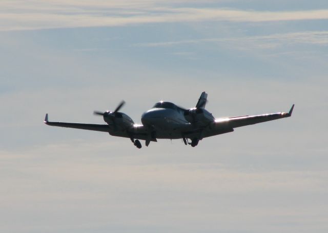 Beechcraft Duke (N440CP) - Off of Runway 32 at Downtown Shreveport in the early morning sun.