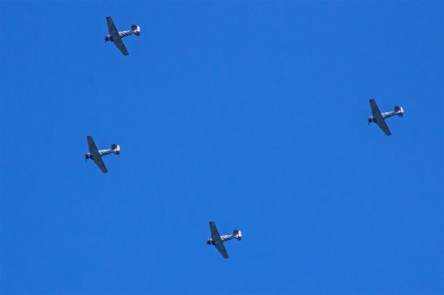 — — - Four of the GEICO SkyTyper SNJ-2 flying West over Northern New Jersey on 29-Aug-2019 at 0843HrsEDT. Likely in transit between the New York International Air Show and the Cleveland National Air Show. 