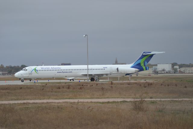 McDonnell Douglas MD-80 (N802WA) - Sitting on the West GA tarmac in FSD