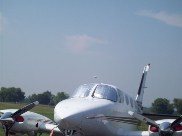 Cessna 340 (N111RB) - Cessna 340 with Cessna 172 flying in the background at Queen City