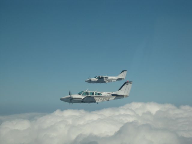 Beechcraft 55 Baron (N74EM) - N359P, N442RW and N74EM returning to the states from a mission trip to Eleuthera with Bahamas Habitat.