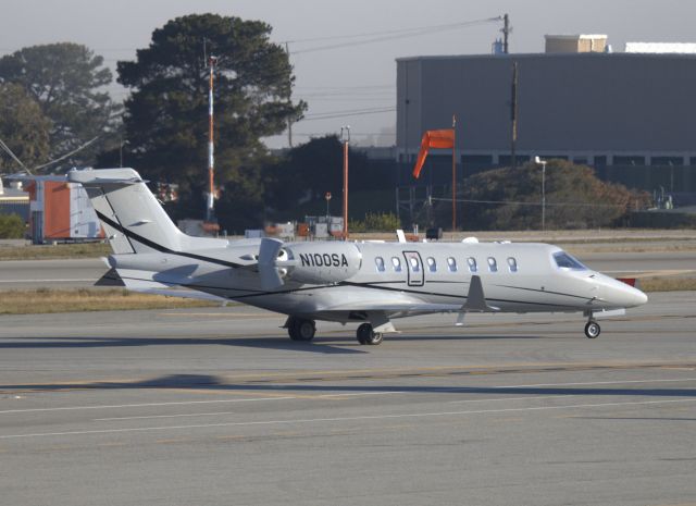 Canadair Challenger 350 (N100SA) - KMRY - Lear 45 Pilot checking the thrust diverters while rolling to the 28s,