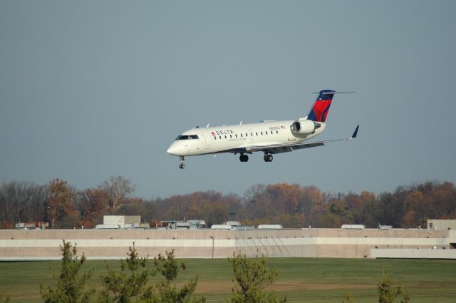 Canadair Regional Jet CRJ-200 (N857AS) - CRJ-200 on final to 18L, notice the angle of the aircraft diving at the runway