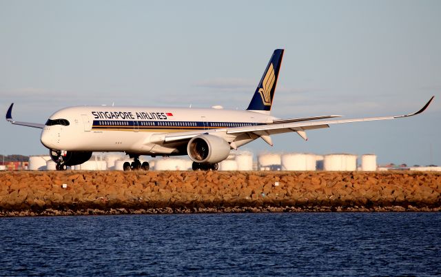 Airbus A350-900 (9V-SHE) - Turning onto Taxiway Alpha