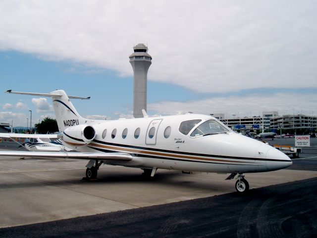 Beechcraft Beechjet (N400PU) - N400PU on the ramp and in front of PDX tower when I flew it Summer 07. Boiler Up!!