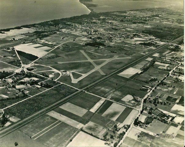 — — - A very old photo of Erie Airport in Erie Pa. Yes it is paved now......