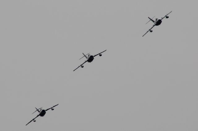 MIKOYAN MiG-17 (NX917F) - Formation of Mig 17's flying below a sky shrouded with Canadian forest fire smoke.  