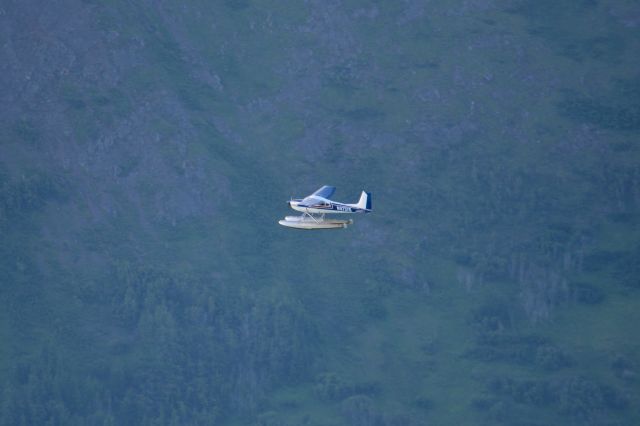 Cessna Skywagon 180 (N9737G) - Taken from Flattop Peak.