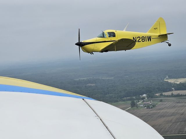 CULVER V (N281W) - 1940 Culver LCA Cadet, s/n 106. Flying this past summer 2023 over Wisconsin on a nice afternoon headed to Iola, WI. Air was hazy from Canadian wildfires, but the hamburgers were worth it. Photo taken from 415C Ercoupe.