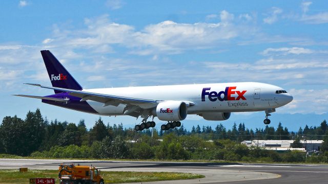 Boeing 777-200 (N893FD) - BOE241 on short final to Rwy 34L to complete a B1 flight on 8.13.19. (B777-FS2 / ln 1616 / cn 41736).