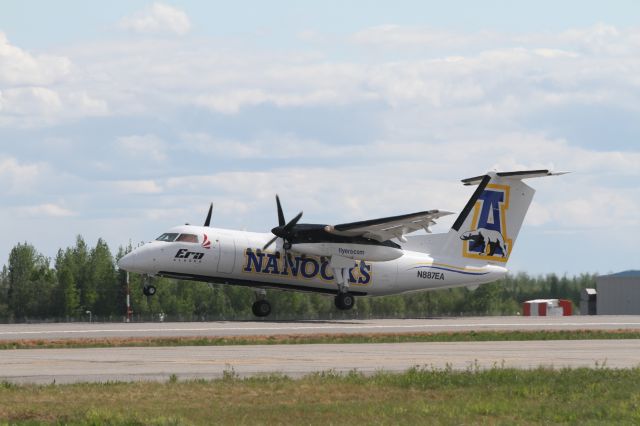 N887EA — - Unveiling of new "University aircraft" at Fairbanks airport One side UAF Nanooks, other side UAA Seawolves