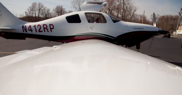 Cessna 400 (N412RP) - Built for speed. At the RELIANT AIR ramp. They have the lowest fuel price on the Danbury (KDXR) airport.