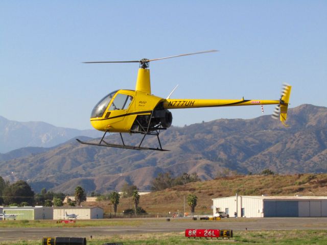 Robinson R-22 (N777UH) - Landing at KPOC