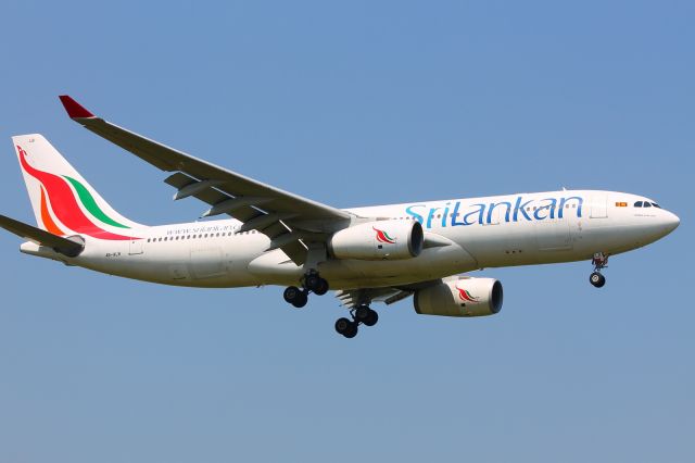 Airbus A330-200 (4R-ALB) - Taken from the grass hill just near T5, about to land on 9L.