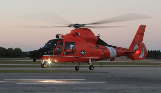 USCG6603 — - An Aerospatiale MH-65D Dauphin departing the ramp at Gulf Air Center, Jack Edwards National Airport, Gulf Shores, AL - March 19, 2019.