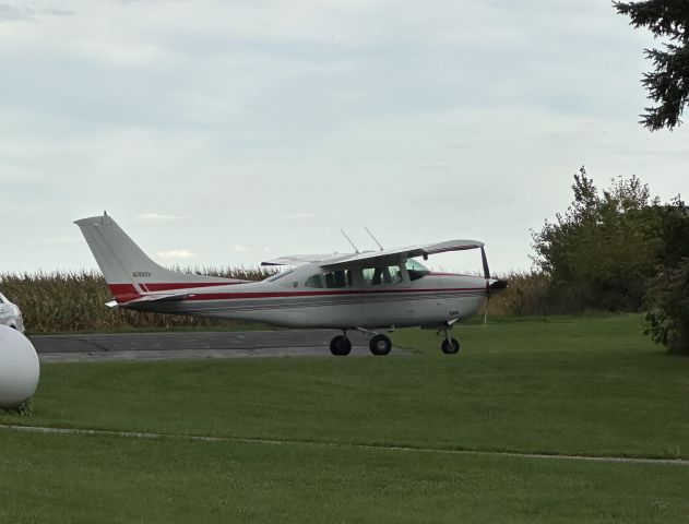 Cessna Centurion (N761SV) - N761SV Parked outside of Nowatzski Field in Markesan, WI. Taken from my phone