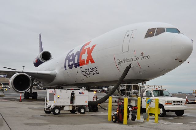 Boeing MD-11 (N585FE) - The all-time worst spot for a heating and AC unit hole.