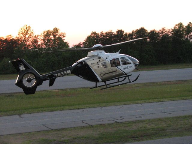 Eurocopter EC-635 (N243AM) - Wake Forest University Baptist Hospital helo landing at Hickory to pick up a patient.