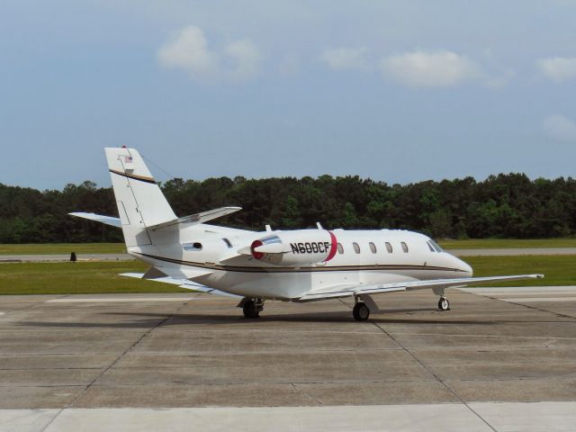 Cessna Citation Excel/XLS (N600CF) - Sitting on the ramp at KMQI in June 2014.