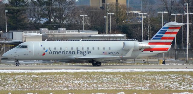 Canadair Regional Jet CRJ-200 (N226JS) - Overlook. Taxiing to runway 18C.