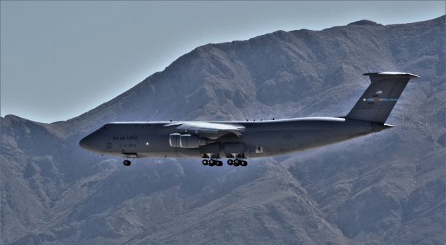 Lockheed C-5 Galaxy — - a glow around the C5 on approach to Nelles