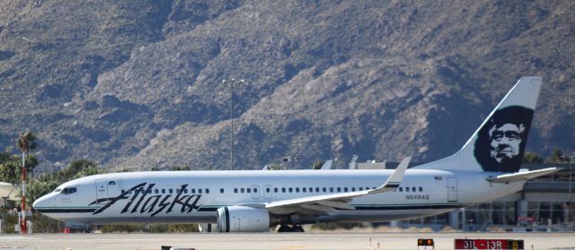 Boeing 737-800 (N549AS) - Taxiing to 31L on 01/22/2011