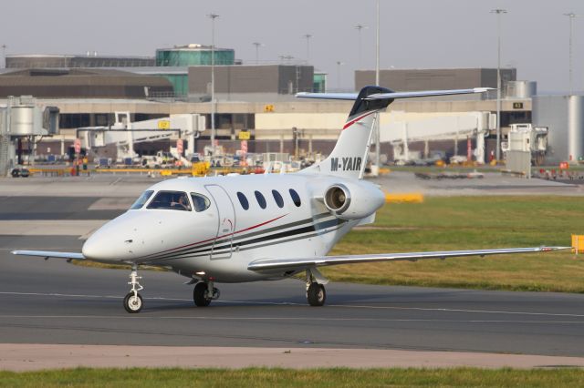 Beechcraft Premier 1 (M-YAIR) - Taxiing back to the apron at Manchester Airport.