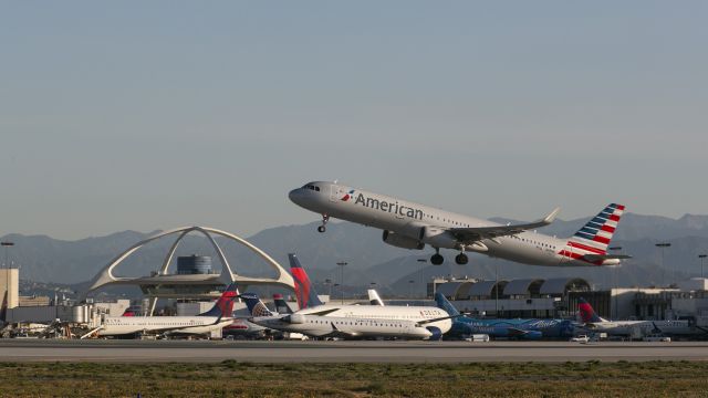 Airbus A321 (N115NN) - Morning take off from runway 25 LAX, Los Angeles International Airport, California USA