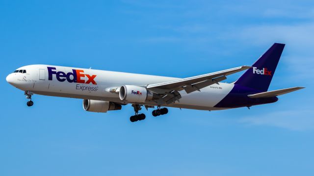 BOEING 767-300 (N160FE) - FedEx 767-300 landing at PHX on 8/9/22. Taken with a Canon 850D and Rokinon 135mm f/2 lens.