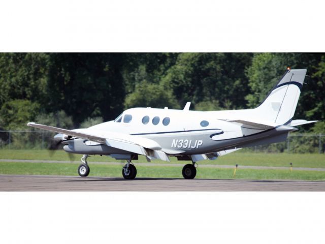 Beechcraft King Air 90 (N331JP) - Rollout after a perfect landing runway 26 at Danbury.