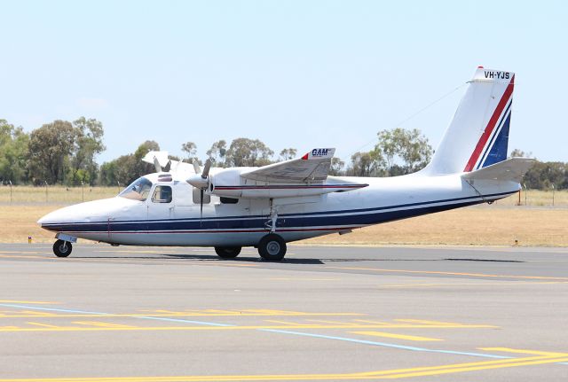 Aero Commander 500 (VH-YJS) - Parked at Emerald Airport on the 25th December 2017